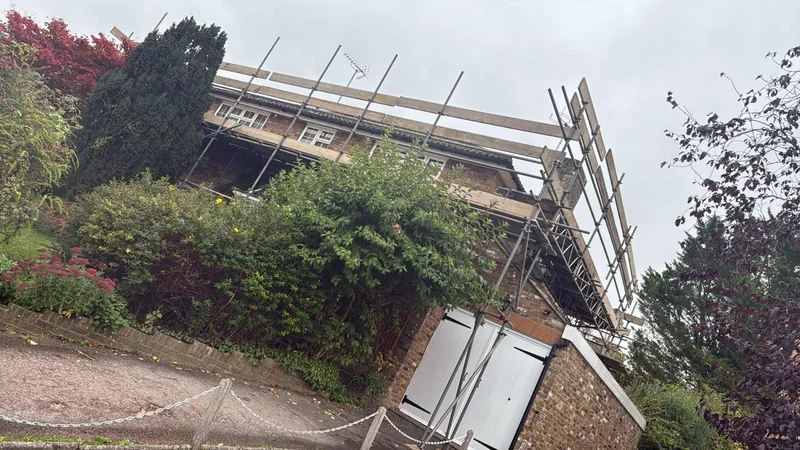 Access above a garage by A&S Scaffolding