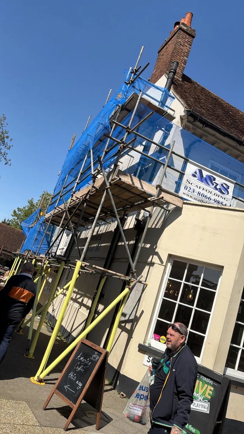 Netting and access on a pub frontage by A&S Scaffolding